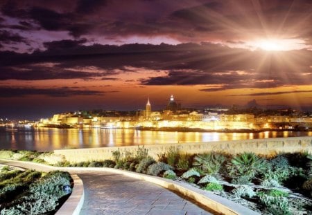 a superior cityscape - clouds, sunrays, lights, city, walkway, bay