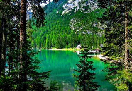 Beautiful lake Braies - nice, cottage, italy, peaceful, water, greenery, calm, refelction, green, house, rays, lake, mountain, shore, lovely, slopes, serenity, btaies, nature, tranquil, beautiful, cabin, europe