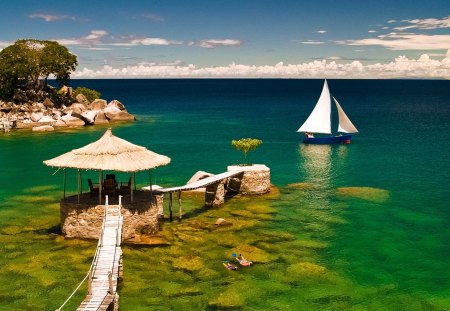 Beautiful Place - beauty, sky, sailboats, paradise, peaceful, rocks, view, clouds, umbrella, summer time, resort, boat, ocean, boats, summer, tropical, sailing, lovely, nature, pier, beautiful, island, splendor, sailboat, sea