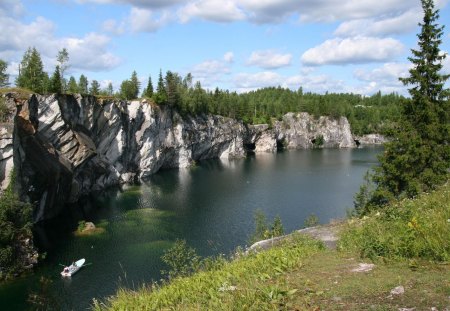 grottos on a lake - cliff, lake, caves, boat, trees, grottos