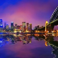 reflection at sydney harbour bridge at night