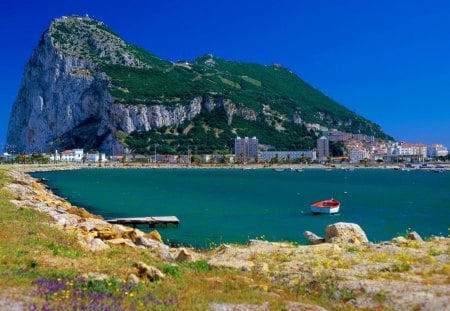 Gibraltar - pretty, countrybeautiful, summer, town, coast, beach, grass, walk, mountain, flowers, gibraltar, shore, exotic, nice, houses, sky, water, vacation, sea, city, travel, lovely, ocean, buildings, rest, village, boats, nature, sands