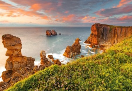 Ocean View - splendor, grass, sunrise, flowers, view, ocean waves, sky, clouds, beautiful, sea, beauty, lovely, ocean, nature, sunset, green, waves, peaceful, rocks