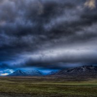 Dark Clouds over Mountain Valley