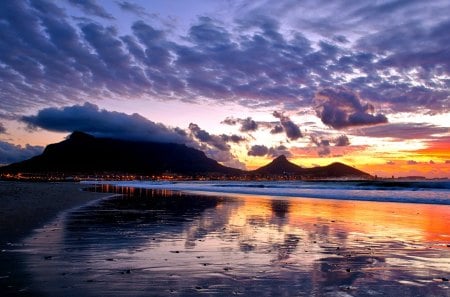 Simply Beautiful - beauty, sky, beach, ocean waves, peaceful, mountains, sunset, amazing, view, reflection, city lights, clouds, sand, ocean, landscape, sunlight, seascape, light, lovely, waves, nature, town, beautiful, city, splendor, colors, sunrise, sea