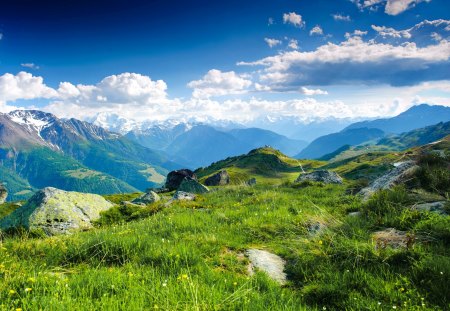 Mountain view - nice, slopew, sky, greenery, rocks, view, pretty, clouds, green, grass, harmony, mountain, lovely, nature, beautiful, flowers, stones