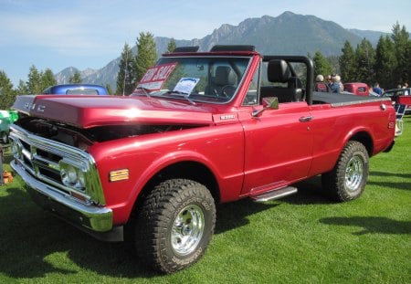 1971 GMC truck 396 - trees, truck, photography, gmc, tires, mountains, black, headlights, red, green, grass