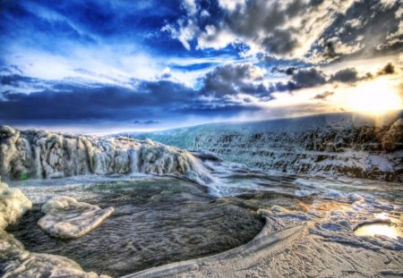 winter view - clouds, water, snow, cliffs, blue sky, sun