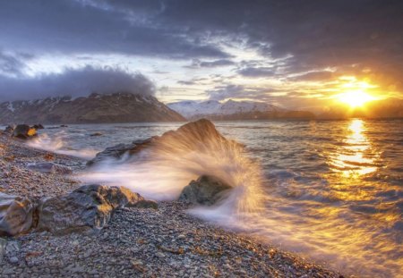 SUNSET SPRAY - reflections, oceans, horizons, beaches, sunshine, seaside, breakers, deserted, sunset, waves, gravel, rocks