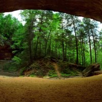 large cave small waterfall