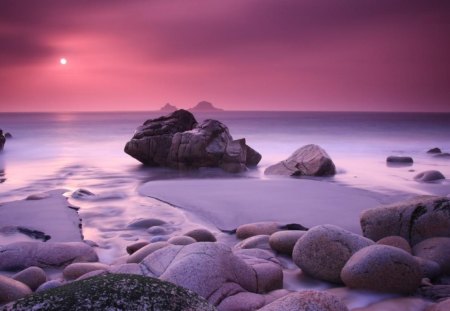 Pink Ocean Shore - sky, ocean, daylight, day, sun, shore, rocks, waves, nature, pink, clouds, sand