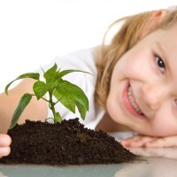 *** Cute baby girl and plant ***