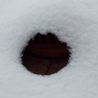 the hole in the snow on the roof