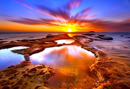 Amazing sunset - nice, sky, sunshine, beach, sundown, water, colorful, sunset, sun rays, gorgeous, pretty, clouds, ocean, sunlight, shore, lovely, nature, beautiful, sunrise, sea