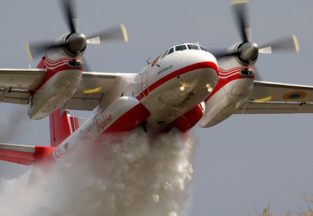 low flying aircraft fighting the fire. - aircraft, flying, fighting, low, fire