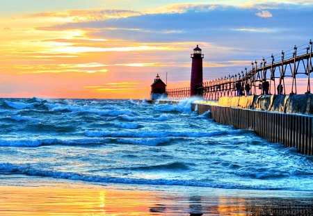 Ocean Waves - blue, amazing, beach, splendor, sunrise, reflection, sand, view, ocean waves, lighthouses, sky, clouds, sunlight, lighthouse, beautiful, sea, beauty, lovely, architecture, ocean, pier, nature, sunset, waves, seascape, peaceful