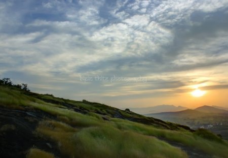 Warm Evening - clouds, hills, blue, fields, evening, grass, sunset, nature, green, sky