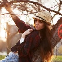 sweet girl posing in the forest