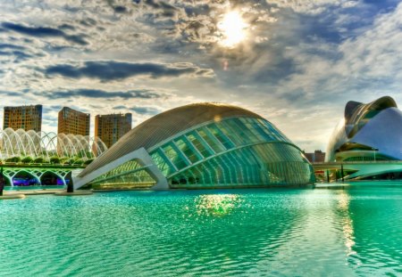 modern buildings under sun - water, clouds, city, buildings, sun