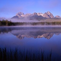 lake with mountains in the background cloud