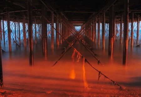 under the boardwalk - red, beach, poles, boardwalk, mist