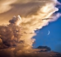 Dramatic Clouds and New Moon