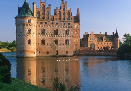 Egeskov Castle, Denmark - ancient, lake, sky, windows, daylight, day, water, nature, tall, reflection, castle, door, blue, architecture, grass, land