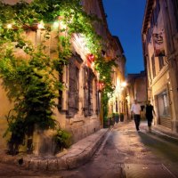 restaurant in alley in france at dusk