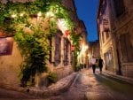 restaurant in alley in france at dusk