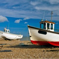 boats parked on the beach