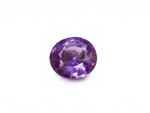 A RARE PURPLE SAPPHIRE GEM STONE