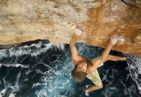 rock climber by the finger tips - athletic, sea, cliff, climber