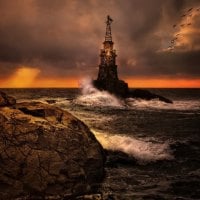 Lighthouse at Stormy Sea