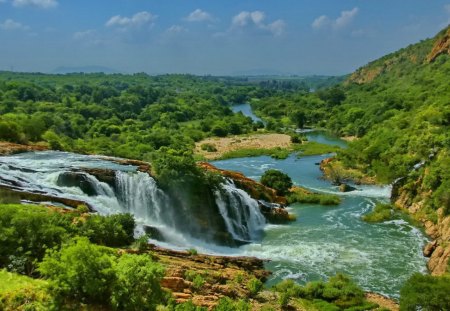 Beautiful waterfall - nice, sky, water, stream, waterfall, rocks, view, pretty, river, clouds, emerald, green, mountain, summer, lovely, nature, beautiful, blue