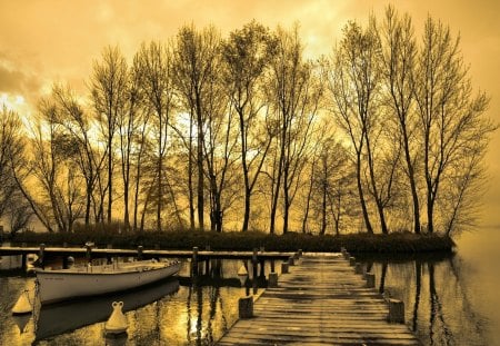 Golden Sunset - autumn colors, wood, boat, splendor, reflection, golden sunset, view, autumn splendor, lake, golden, sky, clouds, trees, water, beautiful, beauty, lovely, tree, pier, fall, boats, wooden, nature, sunset, autumn, peaceful