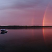 boat with rainbow background