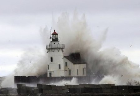 Lighthouse Takes It On The Chin - sky, lighthouse, ocean, wave