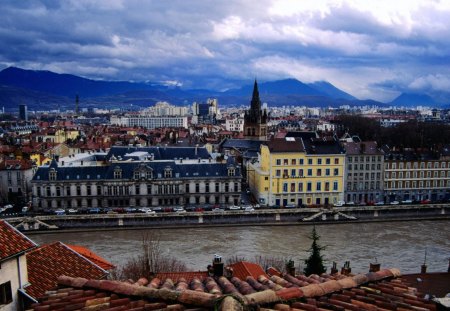 grenoble on the rhone river under french alps - city, mountains, clouds, river