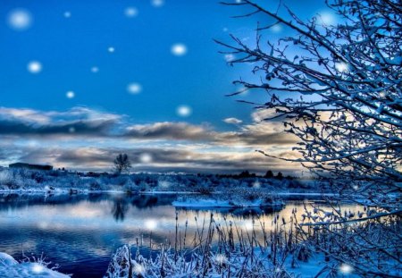 Winter spirit - snowflakes, blue, snow, shore, riverbank, frost, lake, nice, sky, clouds, branches, trees, winter, spirit, beautiful, mirrored, beauty, refelction, lovely, lakeshore, river, frozen, nature, snowing, cold, day