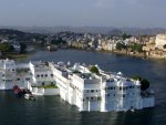 white house in the middle of a river in india