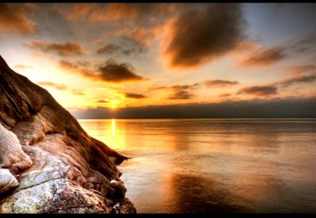 Silence over the lake - lake, rocks, water, skies, sun, dawn