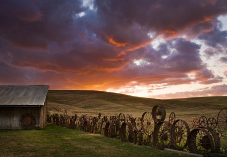 fence of rims on plains farm - plains, fence, rem, clouds, sunset, barn