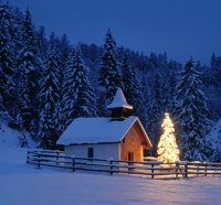 beautiful christmas tree by a chapel in bavaria 