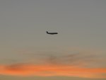 Plane Flight at Dusk