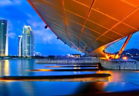 under a bridge in the evening - nature, archiecture, river, city, bridge, lights, landscapes