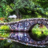 wonderful stone bridge in a park hdr