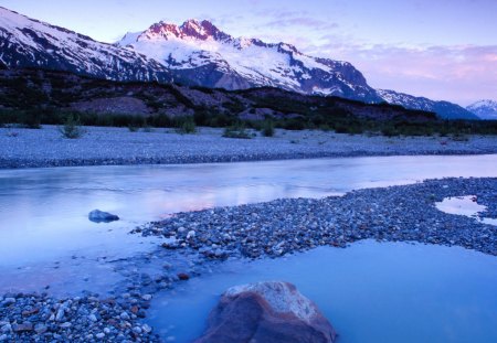 beautiful alsek river in british columbia - banks, river, pebbles, mountains