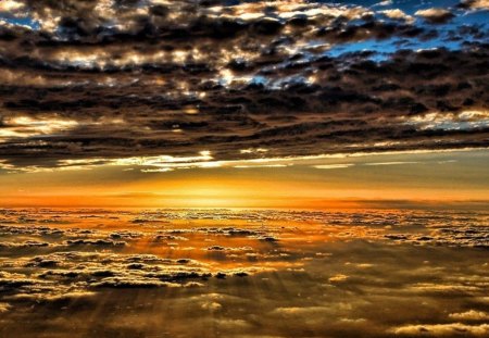 sunset between the clouds - clouds, sunset, rays, above