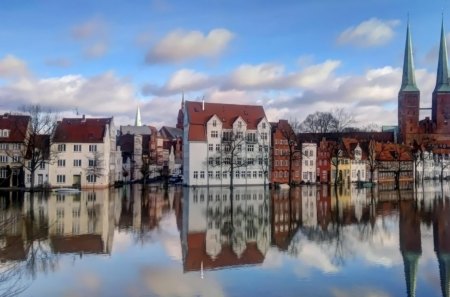 reflection in a flooded european town - flood, clouds, town, reflection