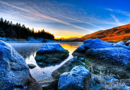 Frost at Sunrise - mirror, shadows, icy, smoky, panorama, photography, winterscape, fog, surface, reflections, stones, blue, creeks, pond, multicolor, rivers, clouds, colours, ice, snow, rocks, frozen, frost, hdr, white, colorful, ambar, branches, sky, sunsets, hill, foggy, pines, fullscreen, sunrise, green, high dynamic range, sun rays, amber, plants, forests, golden, picture, gold, landscape, photo, colors, mounts, black, leaves, horizo, photosho, smoke, view, image, leaf, nature, cold, water, riverscape, photoshop, sunny, trunks, sunrays, orange, reflex